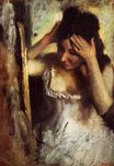 Edgar Degas - Woman Combing Her Hair in front of a Mirror 1877